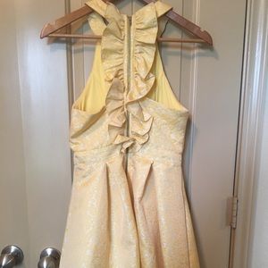 Yellow fit and flare dress.